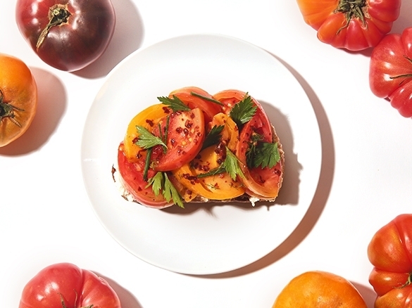 Summer is peak heirloom tomato season, so it’s only right our chefs whipped up a new special to highlight this delicious ingredient. The Heirloom Toast features lemon ricotta, sherry vinaigrette, Aleppo pepper, Maldon salt and freshly picked herbs on sourdough bread. Finished with a drizzle of balsamic glaze and chili oil for a little heat, this is the perfect snack or light lunch. Order in our app or online now!